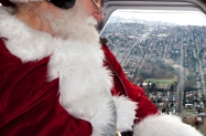 nyca-mofsanta-12_17-jh-santa-checks-the-view-of-seattle