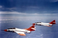 a 1280px-F8F-8T_Cougars_of_VMT-1_in_flight_in_1962